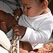 Baby with flute photograph.